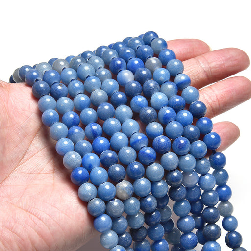This is a Dakota Stones 8mm Blue Aventurine Large Hole Gemstone strand with round beads in 8 inch strand.