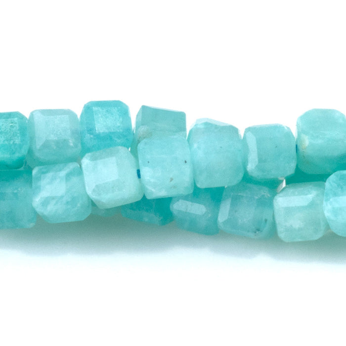 This is a Dakota Stones 4mm Brazilian Amazonite Gemstone strand with natural A grade table-cut cube beads in 15-16 inch strand.