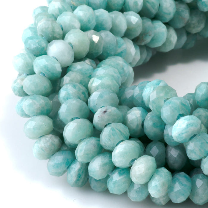 This is a Dakota Stones 5x8mm Brazilian Amazonite Large Hole Gemstone strand with faceted rondelle beads in 8 inch strand.
