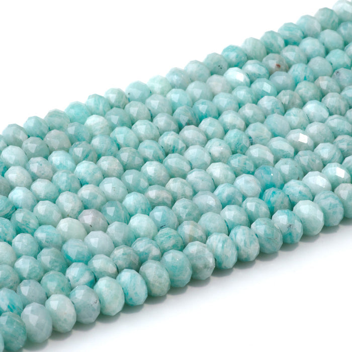 This is a Dakota Stones 5x8mm Brazilian Amazonite Large Hole Gemstone strand with faceted rondelle beads in 8 inch strand.