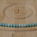 This is a Dakota Stones 5x8mm Brazilian Amazonite Large Hole Gemstone strand with faceted rondelle beads in 8 inch strand.