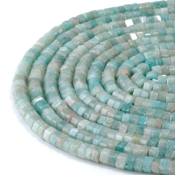 This is a Dakota Stones 6mm Brazilian Amazonite Large Hole Gemstone strand with faceted hexagon beads in 8 inch strand.