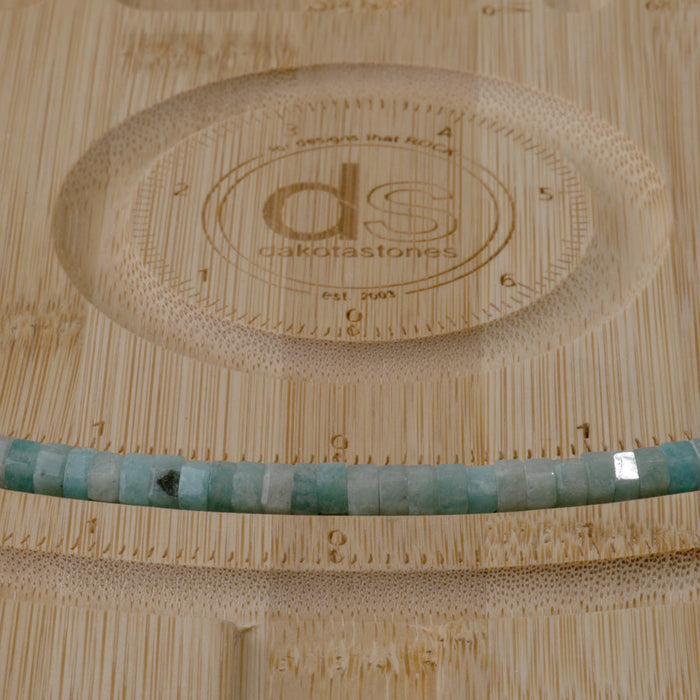 This is a Dakota Stones 6mm Brazilian Amazonite Large Hole Gemstone strand with faceted hexagon beads in 8 inch strand.