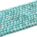 This is a Dakota Stones 6mm Brazilian Amazonite Large Hole Gemstone strand with round beads in 8 inch strand.