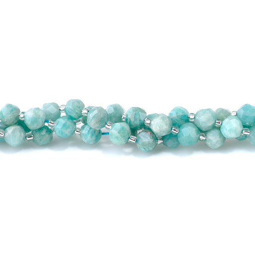 This is a Dakota Stones 7x8mm Brazilian Amazonite Gemstone strand with faceted nugget beads in 15-16 inch strand.