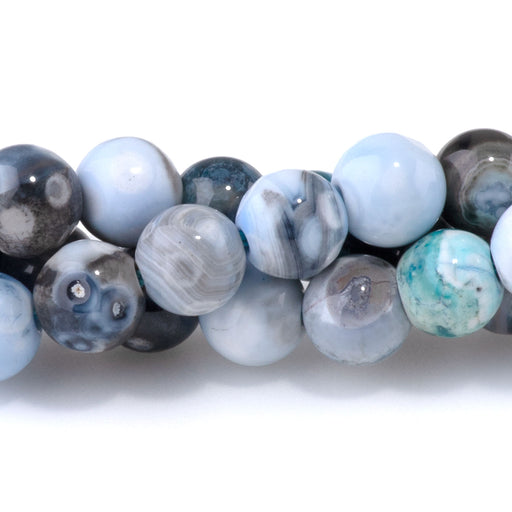 This is a Dakota Stones 6mm Blue Black Porcelain Agate Gemstone strand with round beads.
