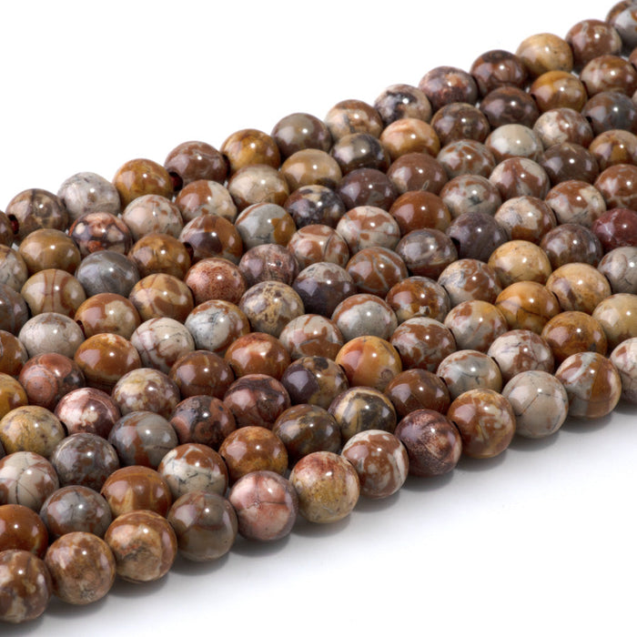 This is a Dakota Stones 8mm Birds Eye Rhyolite Large Hole Gemstone strand with round beads in 8 inch strand.