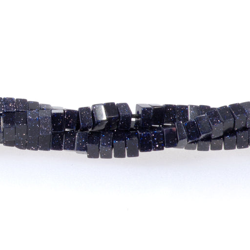 This is a Dakota Stones 1x2mm Blue Goldstone Gemstone strand with rondelle square beads in 15-16 inch strand.
