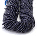 This is a Dakota Stones 3mm Special Price Blue Goldstone Gemstone strand with faceted round beads in 15 inch strand.