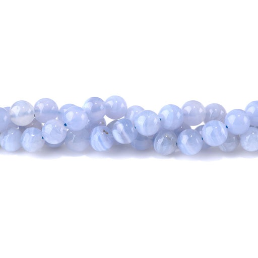 This is a Dakota Stones 10mm Blue Lace Agate Gemstone strand with A grade round beads in 15-16 inch strand.