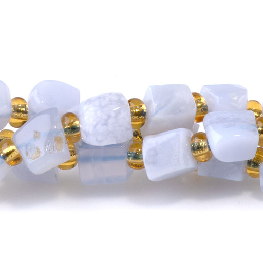 This is a Dakota Stones 4-6mm Blue Lace Agate Gemstone strand with A grade irregular cube beads in 15-16 inch strand.