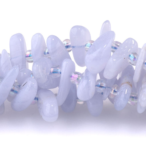 This is a Dakota Stones 5x10-20mm Blue Lace Agate Top Drill Gemstone strand of round beads in 15-16 inch strand.