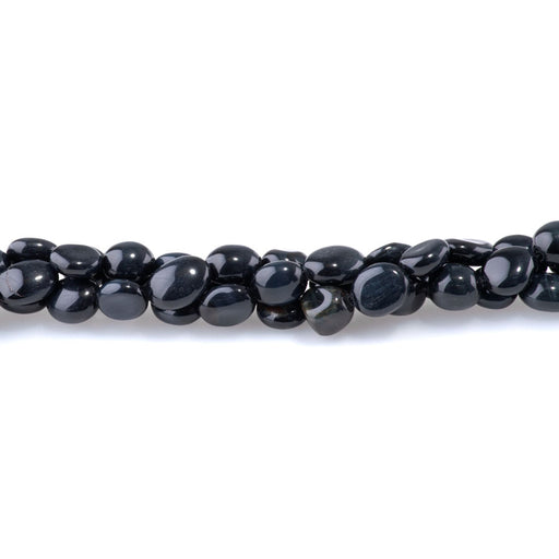 This is a Dakota Stones Blue Tiger Eye pebble from the Dakota Stones collection.