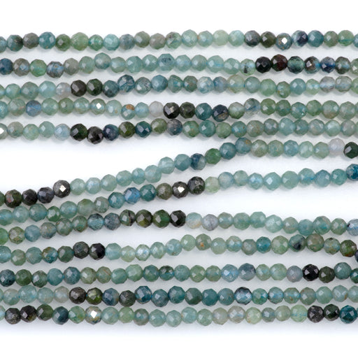 This is a Dakota Stones 3mm Blue Tourmaline Banded Gemstone strand with faceted round beads in 15 inch strand.