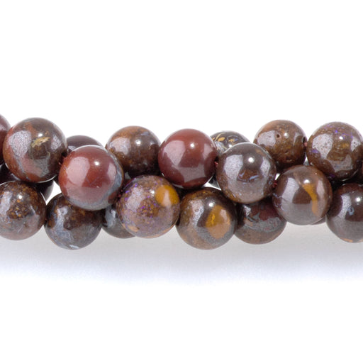 This is a Dakota Stones 4mm Australian Boulder Opal Gemstone strand with round beads in 15-16 inch strand.
