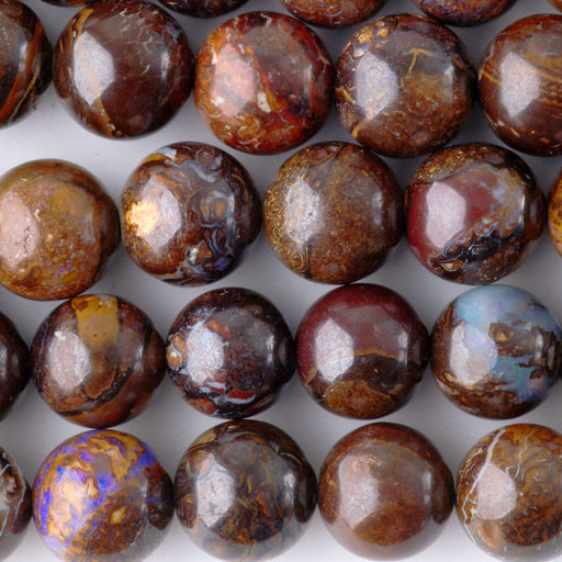 This is a Dakota Stones 8-9mm Australian Boulder Opal Necklace Gemstone strand with round beads in 15-16 inch strand.