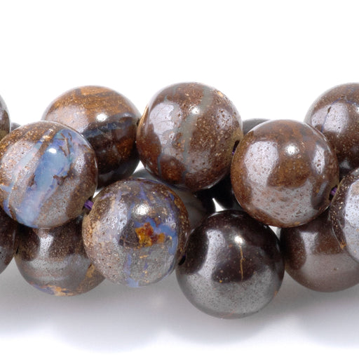 This is a Dakota Stones 8mm Australian Boulder Opal Gemstone strand with round beads in 15-16 inch strand.