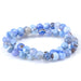 This is a Dakota Stones Blue Porcelain Agate8mm Gemstone strand with round beads in 15-16 inch strand.