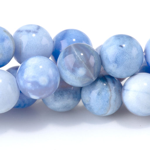 This is a Dakota Stones Blue Porcelain Agate8mm Gemstone strand with round beads in 15-16 inch strand.