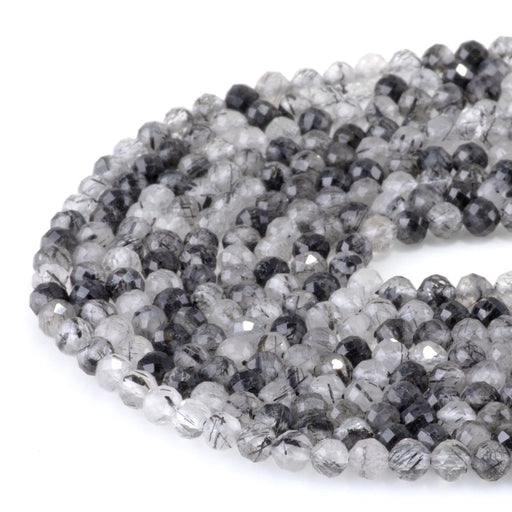This is a Dakota Stones 4mm Black Rutilated Quartz Micofaceted Gemstone strand with round beads in 15-16 inch strand.