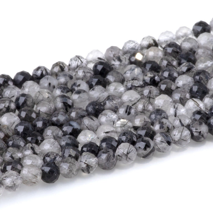 This is a Dakota Stones 4mm Black Rutilated Quartz Micofaceted Gemstone strand with round beads in 15-16 inch strand.