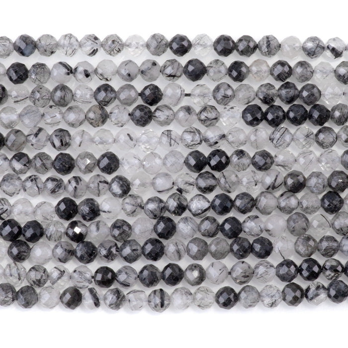 This is a Dakota Stones 4mm Black Rutilated Quartz Micofaceted Gemstone strand with round beads in 15-16 inch strand.