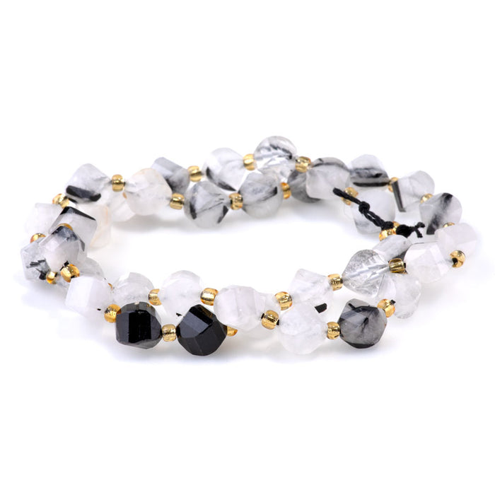 Black Rutilated Quartz 7x8mm Faceted Swirl Oval - 15-16 Inch