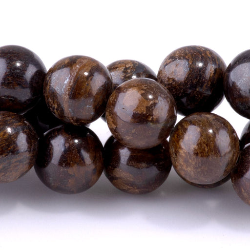 This is a Dakota Stones 10mm Bronzite Gemstone strand with round beads in 15-16 inch strand.