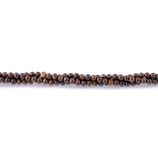 This is a Dakota Stones 4mm Bronzite Gemstone strand with round beads in 15-16 inch strand.