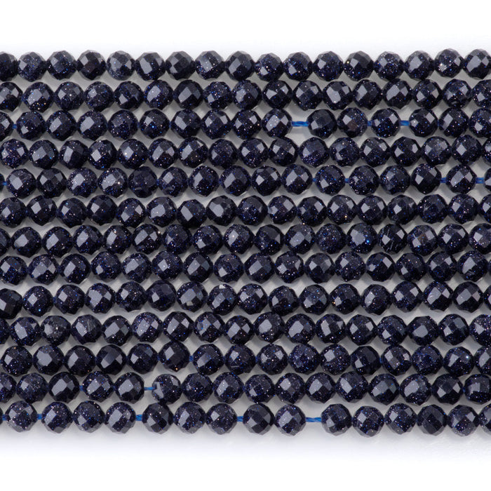 This is a Dakota Stones 4mm Blue Goldstone Microfaceted Gemstone strand with round beads in 15-16 inch strand.