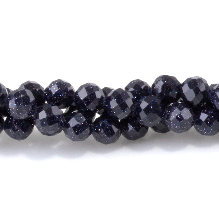 This is a Dakota Stones 4mm Blue Goldstone Microfaceted Gemstone strand with round beads in 15-16 inch strand.