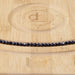 This is a Dakota Stones 4mm Blue Goldstone Microfaceted Gemstone strand with round beads in 15-16 inch strand.