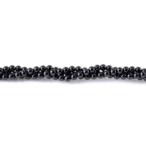 This is a Dakota Stones 5mm Black Spinel Gemstone strand with round beads in 15-16 inch strand.