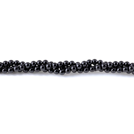 This is a Dakota Stones 5mm Black Spinel Gemstone strand with round beads in 15-16 inch strand.