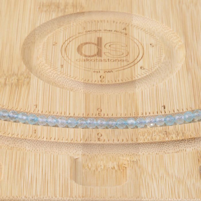 This is a Dakota Stones 4mm Blue Topaz Microfaceted Gemstone strand with A grade round beads in 15-16 inch strand.