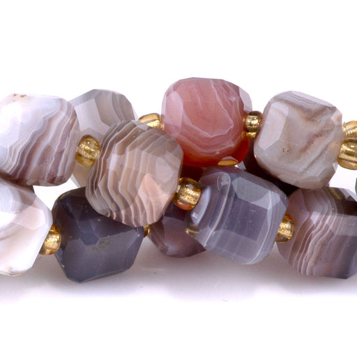 This is a Dakota Stones Botswana Agate Mm Gemstone strand with table-cut cube beads in 15-16 inch strand.