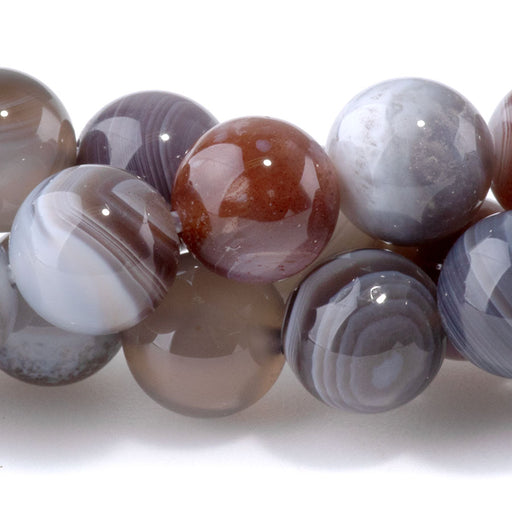 This is a Dakota Stones 8mm Botswana Agate Gemstone strand with round beads in 8 inch strand.
