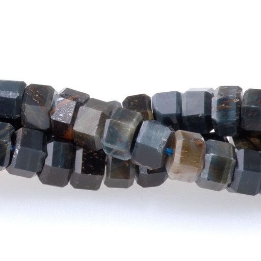This is a Dakota Stones 6mm Blue Yellow Tiger Eye Hexagon Gemstone strand of round beads in 15-16 inch strand.