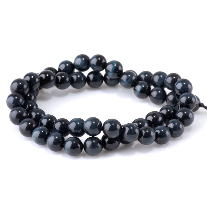 This is a Dakota Stones 8mm Blue Tiger Eye Gemstone strand with AAA grade round beads in 15-16 inch strand.