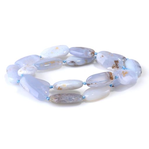 This is a Dakota Stones 12x20-13x25mm Chalcedony Gemstone strand with free-form oval beads in 15-16 inch strand.