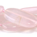 This is a Dakota Stones 13x22-30mm Pink Chalcedony Gemstone strand with oval beads in 15-16 inch strand.