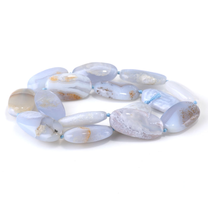 This is a Dakota Stones 15x20-28mm Chalcedony Gemstone strand with free-form oval beads in 15-16 inch strand.