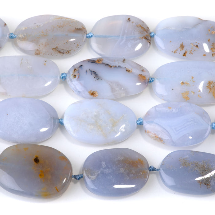 This is a Dakota Stones 15x20-28mm Chalcedony Gemstone strand with free-form oval beads in 15-16 inch strand.
