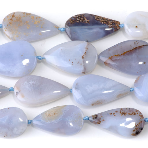 This is a Dakota Stones 15x25-17x28mm Chalcedony Gemstone strand with tear drop beads in 15-16 inch strand.