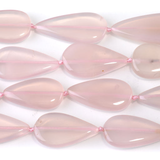 This is a Dakota Stones 15x22-30mm Pink Chalcedony Gemstone strand with tear drop beads in 15-16 inch strand.