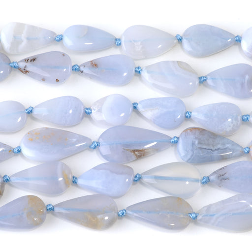 This is a Dakota Stones 8x16-12x22mm Chalcedony Gemstone strand with tear drop beads in 15-16 inch strand.