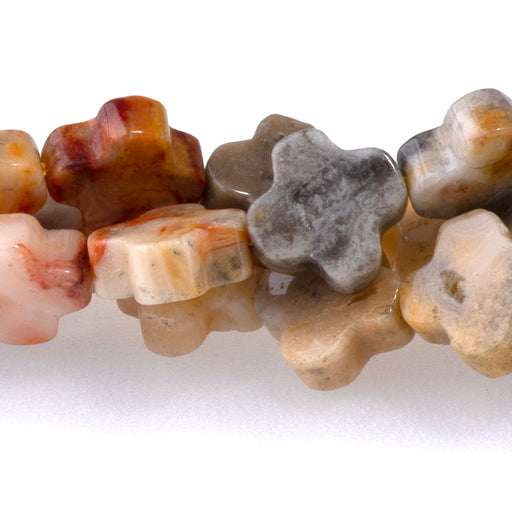 This is a Dakota Stones 8mm Crazy Lace Agate Gemstone strand with cross beads in 15-16 inch strand.