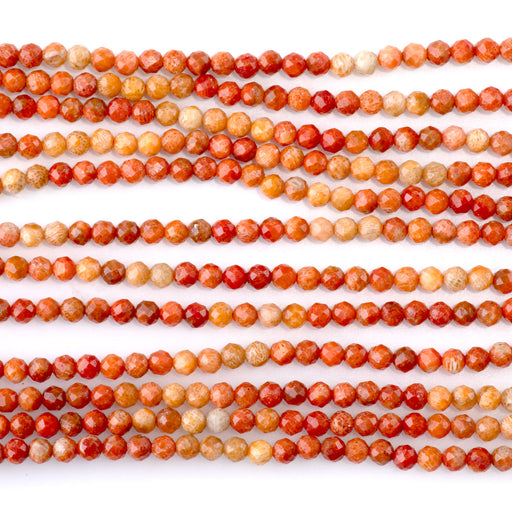 This is a Dakota Stones 3mm Red Coral Banded Gemstone strand with faceted round beads in 15-16 inch strand.