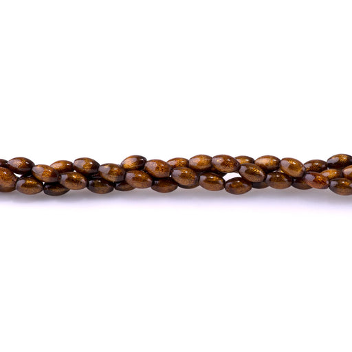 This is a Dakota Stones 6-10mm Coral Rice Golden Gemstone strand of round beads in 15-16 inch strand.