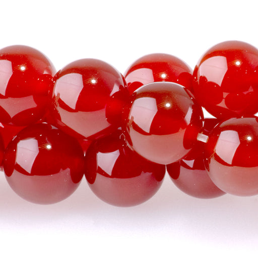 This is a Dakota Stones 10mm Carnelian Gemstone strand with round beads in 15-16 inch strand.